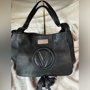 Huge black leather Valentino.